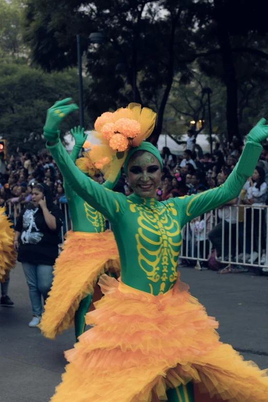 a young person wearing colorful clothing in the street