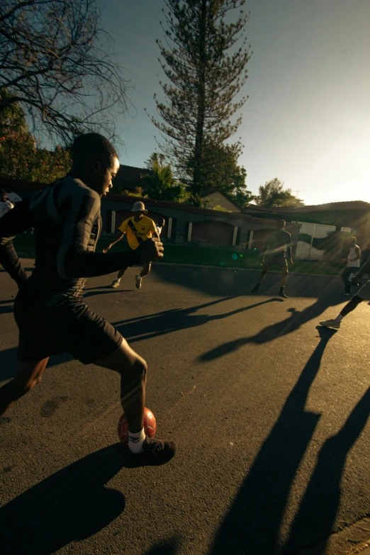 a group of people jogging on the street