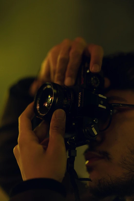 a man taking a picture with a camera