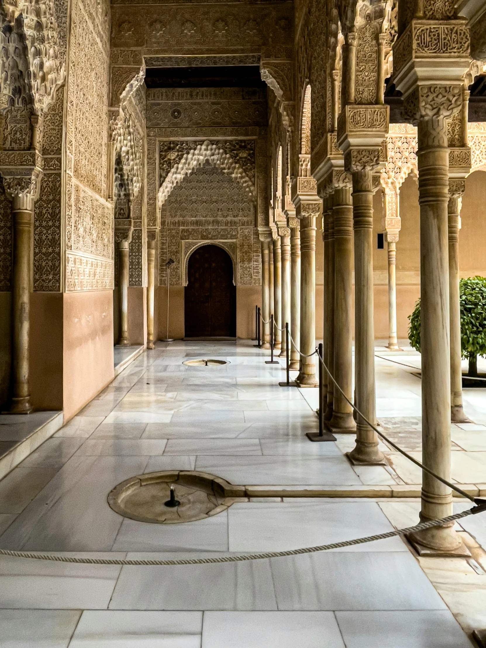 arches and columns lining the side of a building