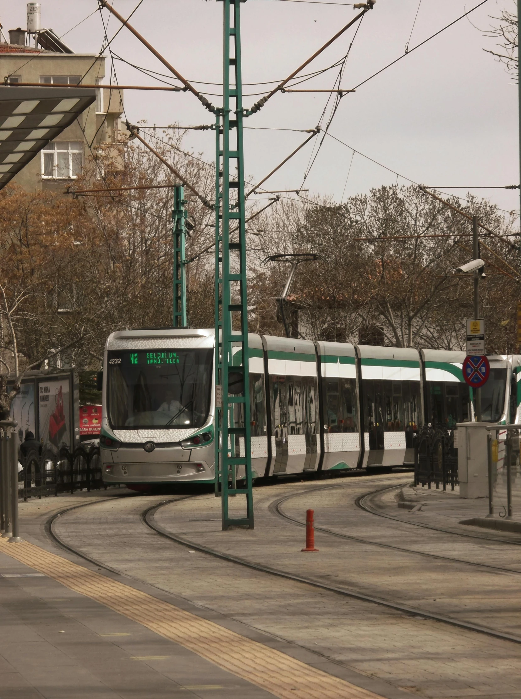 a city bus pulling into the train station