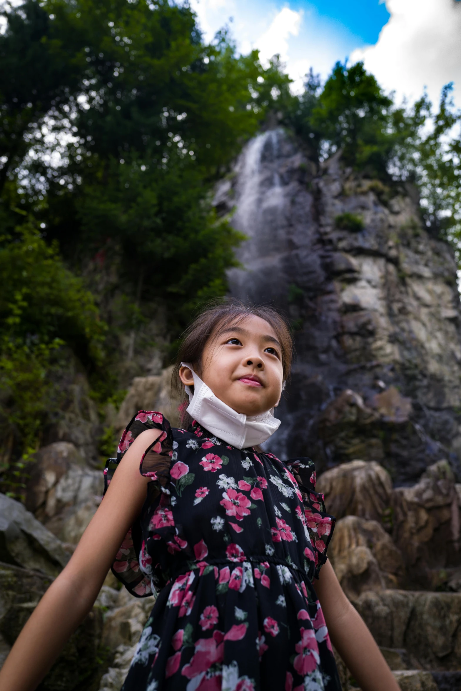 an image of a girl looking up to the sky