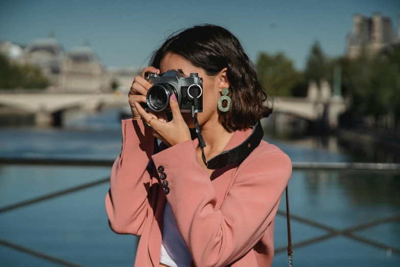 a woman taking a po with her digital camera