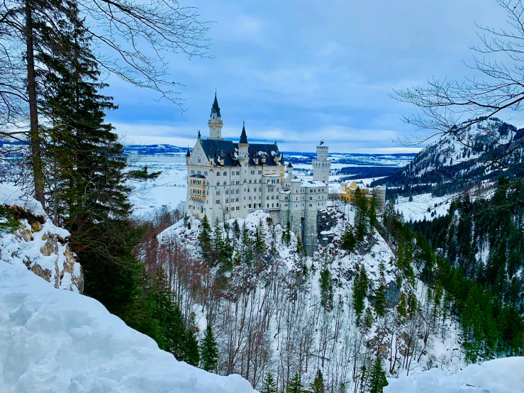 the castle is situated on top of the mountain