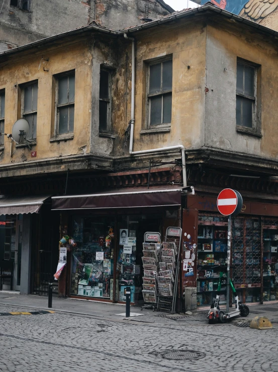 an old building with a bunch of items on display