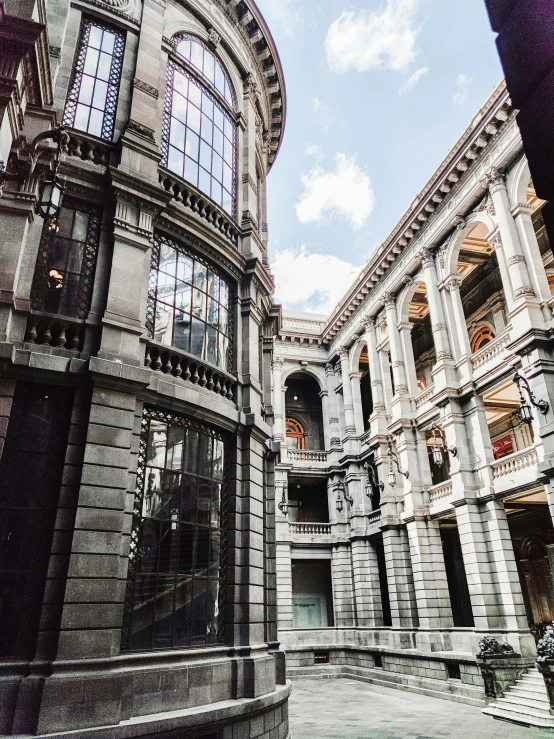 a couple of large buildings with a sky background