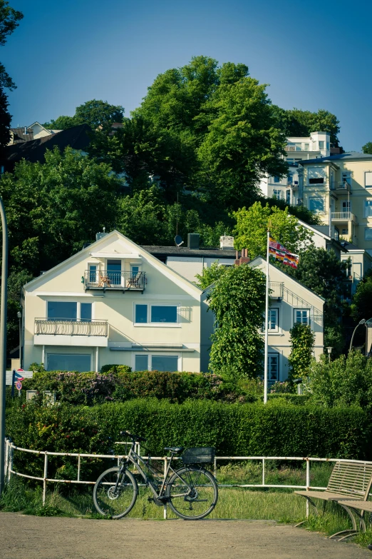 a house on a hill near the woods