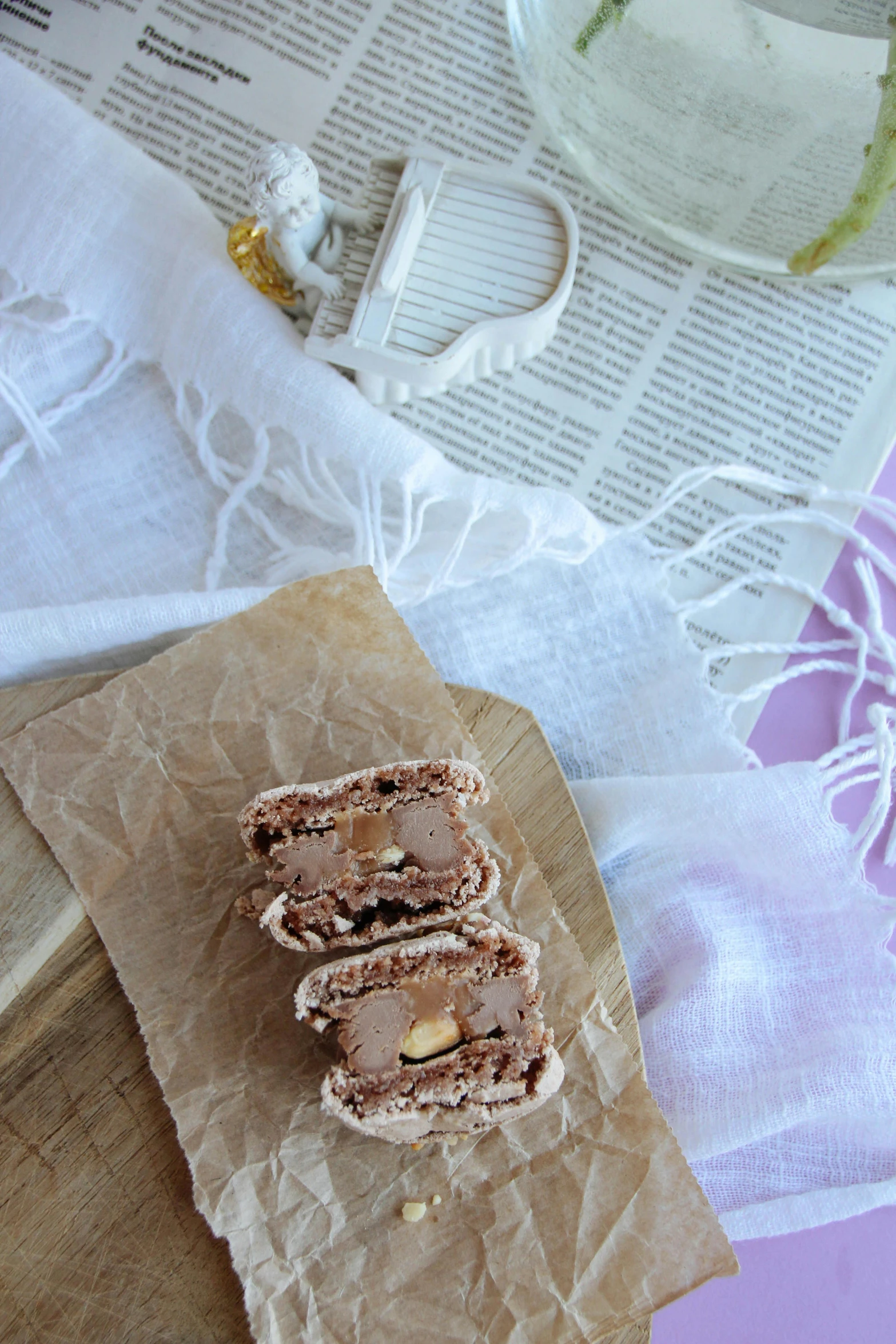 a pair of pieces of desert sitting on top of some brown paper