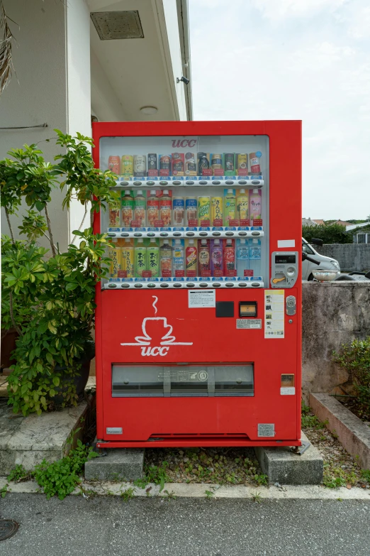 an old machine is sitting by the curb