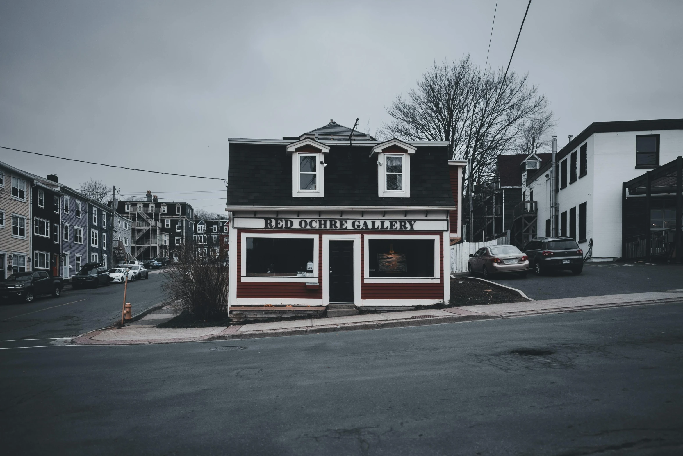 the exterior of a business that is in an old city street