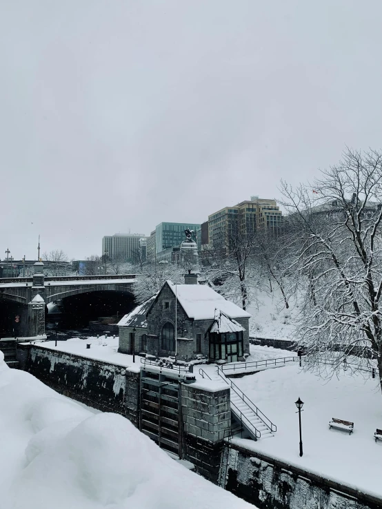 a train is going down some snowy tracks