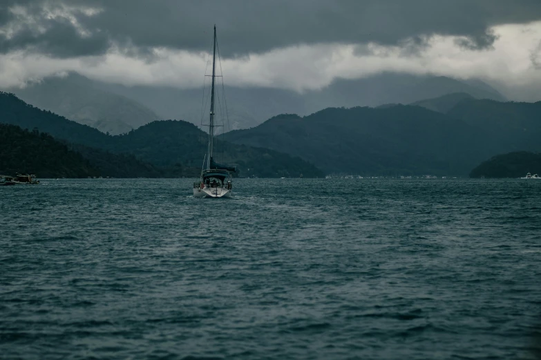 an empty boat floating on a large body of water