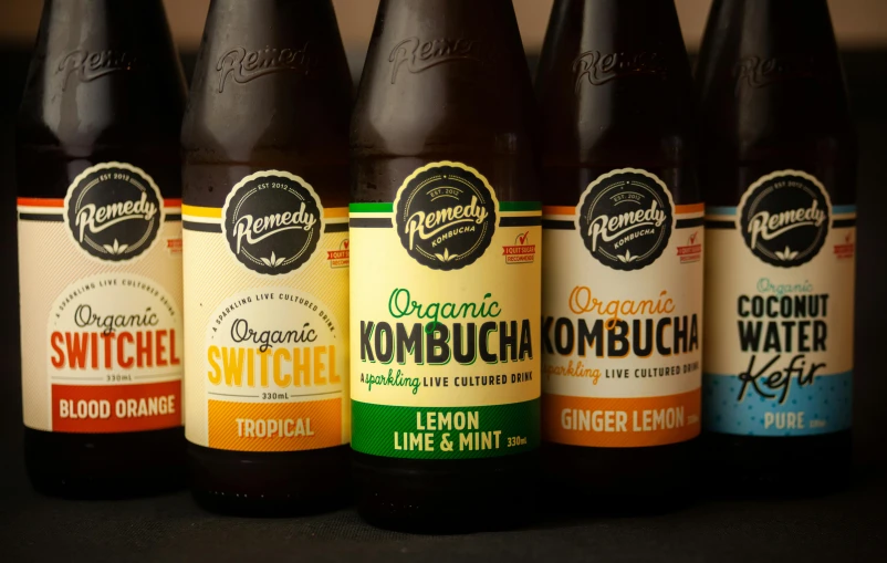 four bottle bottles with different flavors of beer