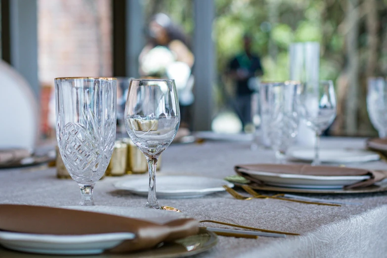 the glassware are on the table and ready for people to eat