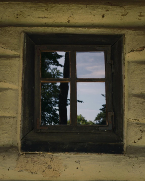 a window is shown on the side of a building