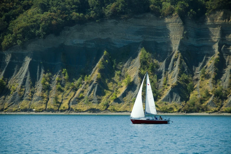 a sailboat that is traveling in the water