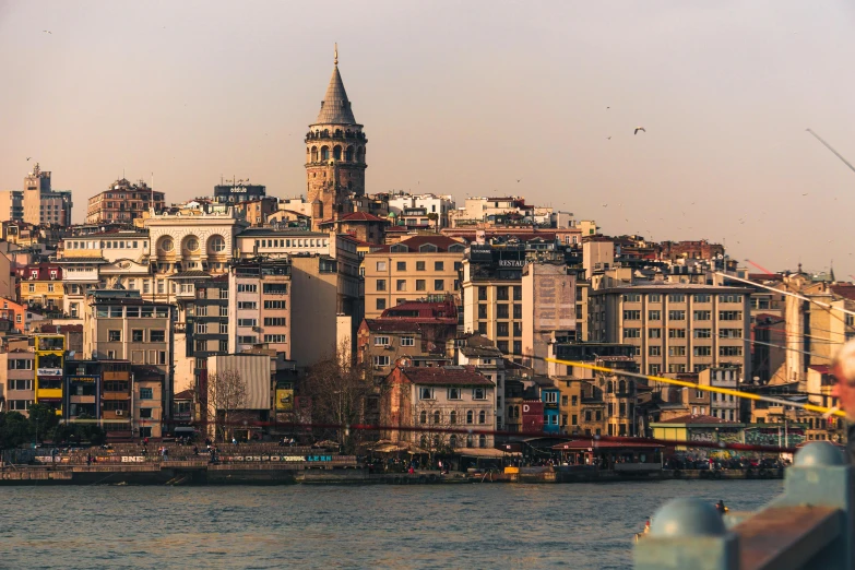 there is a skyline with some buildings on the water