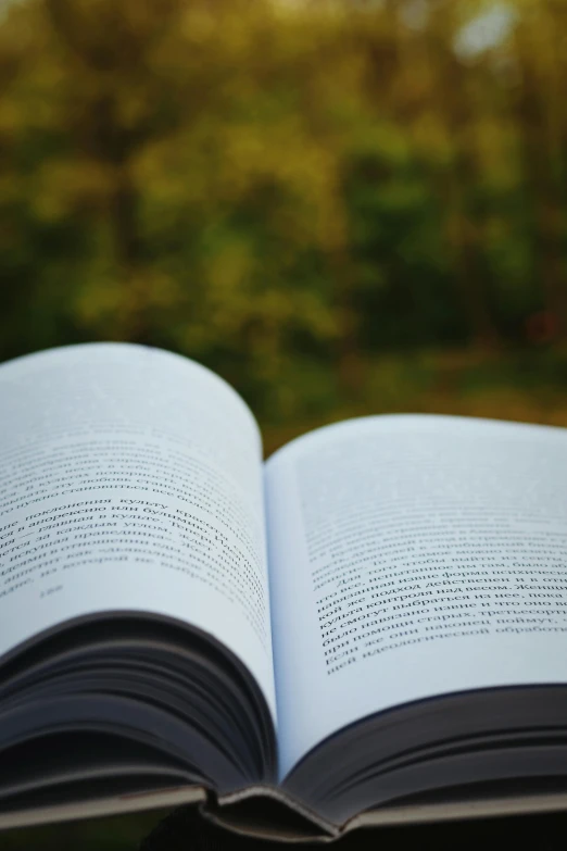 an open book sitting on top of a table