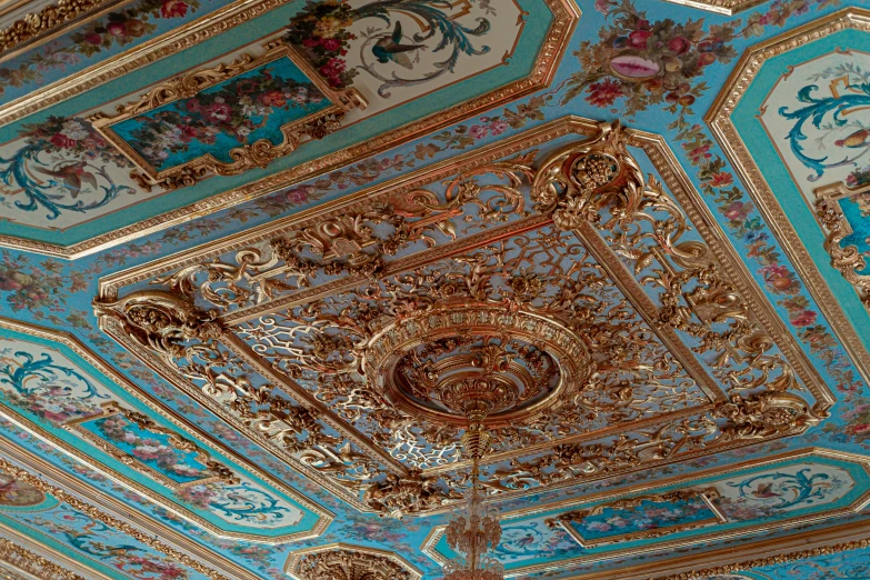 a ceiling made out of elaborately detailed art