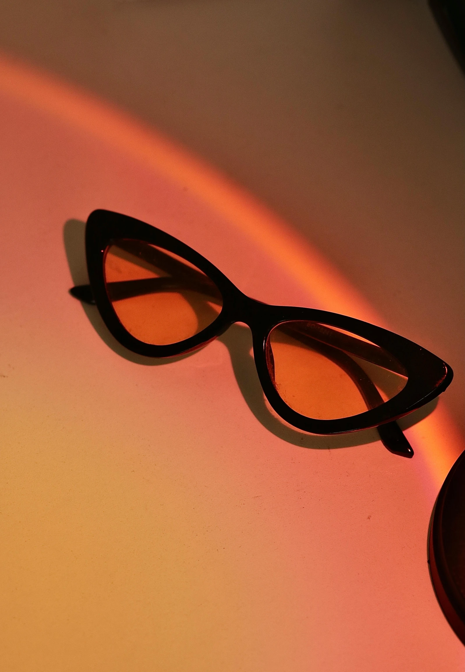 a pair of sunglasses sitting on a table