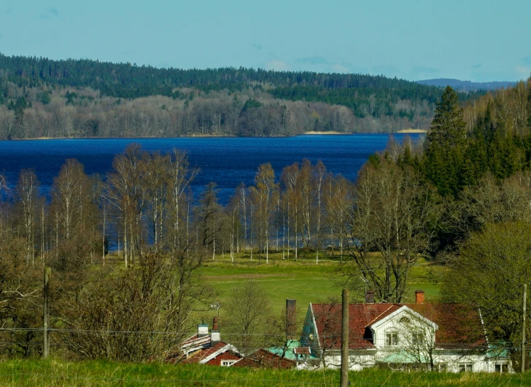 an image of a home near the water