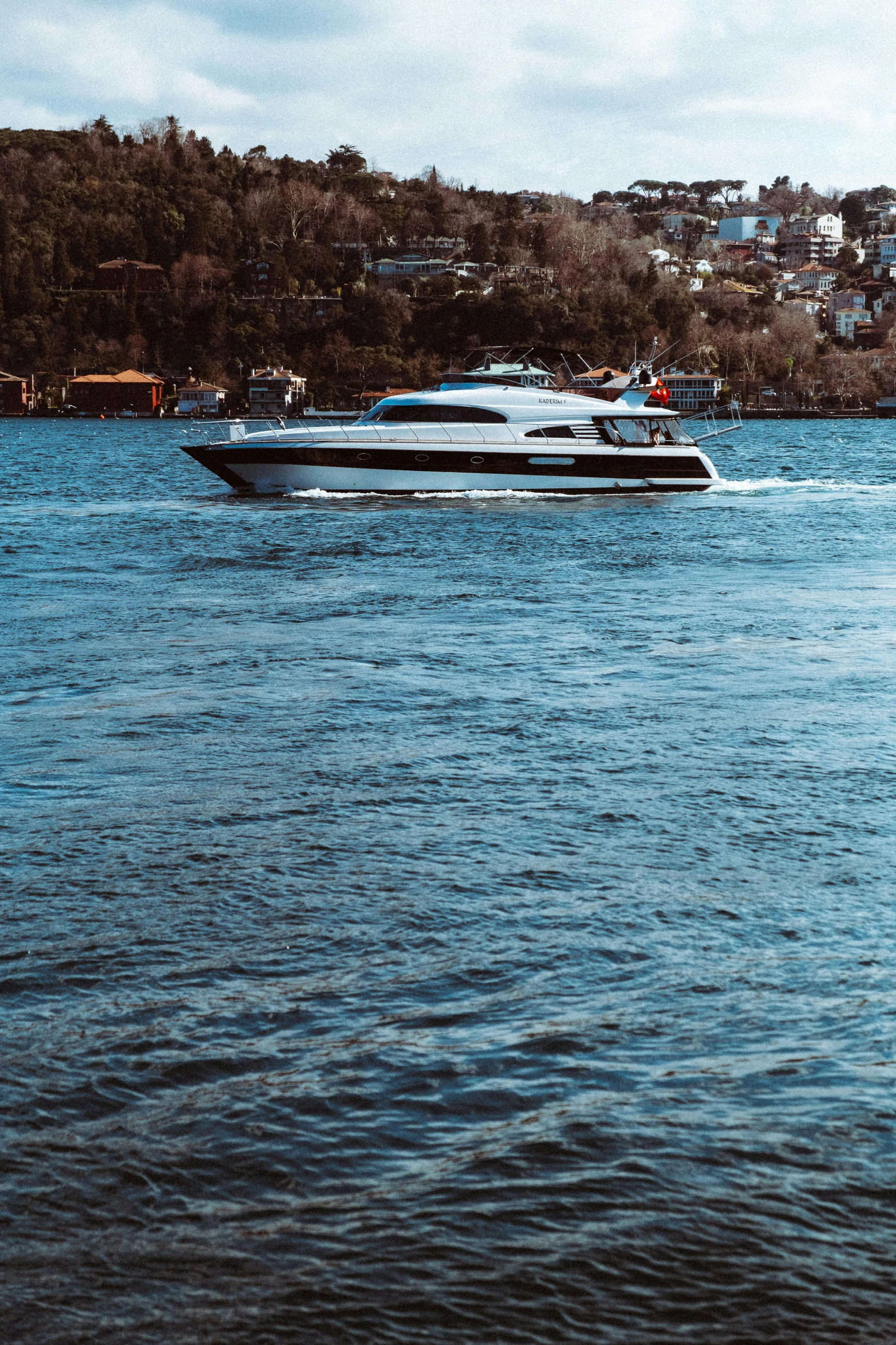 a black and white boat in the water