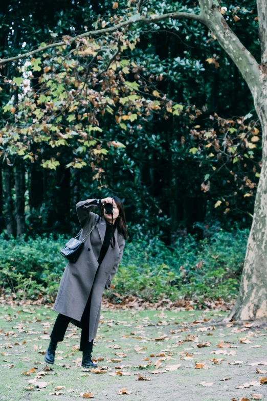 a woman taking pictures through the camera lens