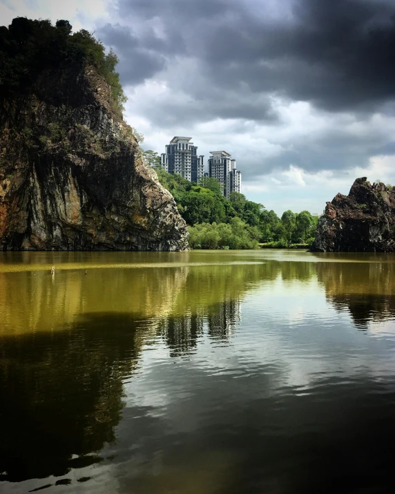 a view of a city sits above the water