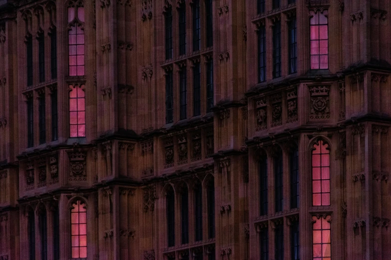 a closeup of a building at dusk with bright light