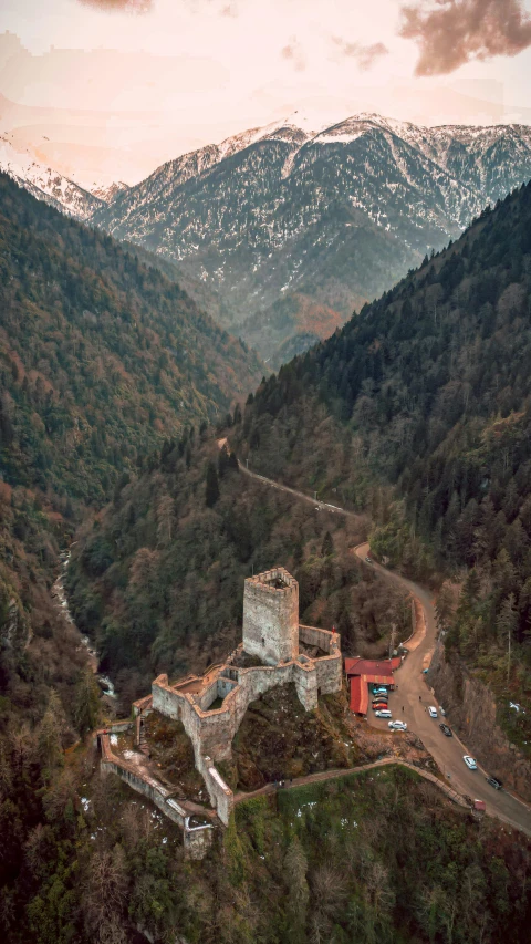 a scenic view from above of a town on a mountain