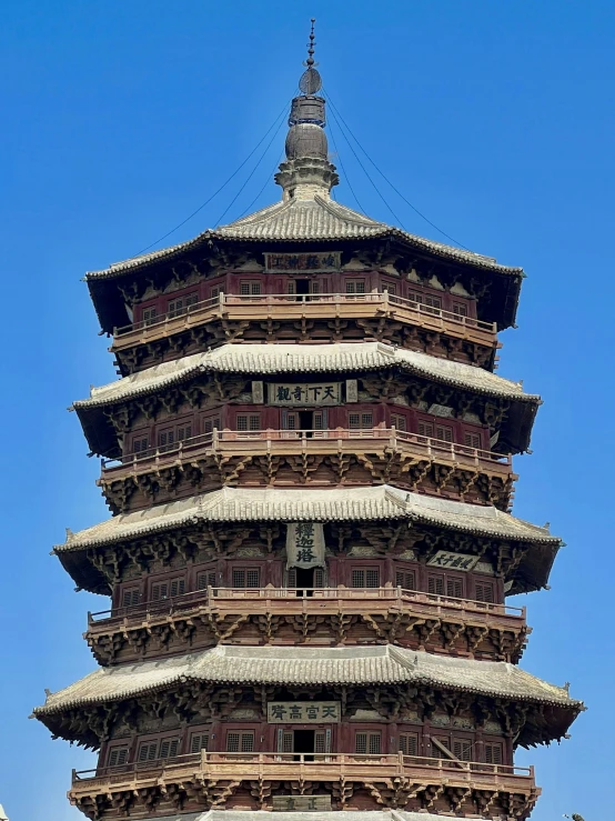 a tall tower with a clock at the top