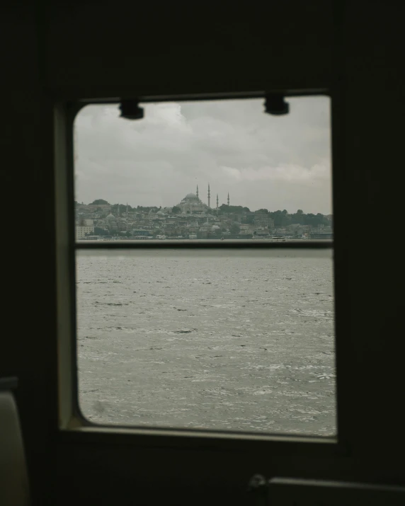 a view out of a window of the ocean