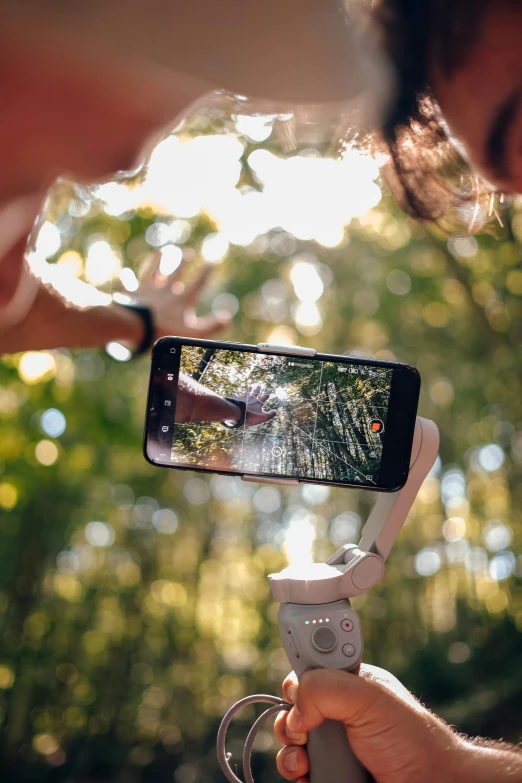 a woman takes her picture while taking a po