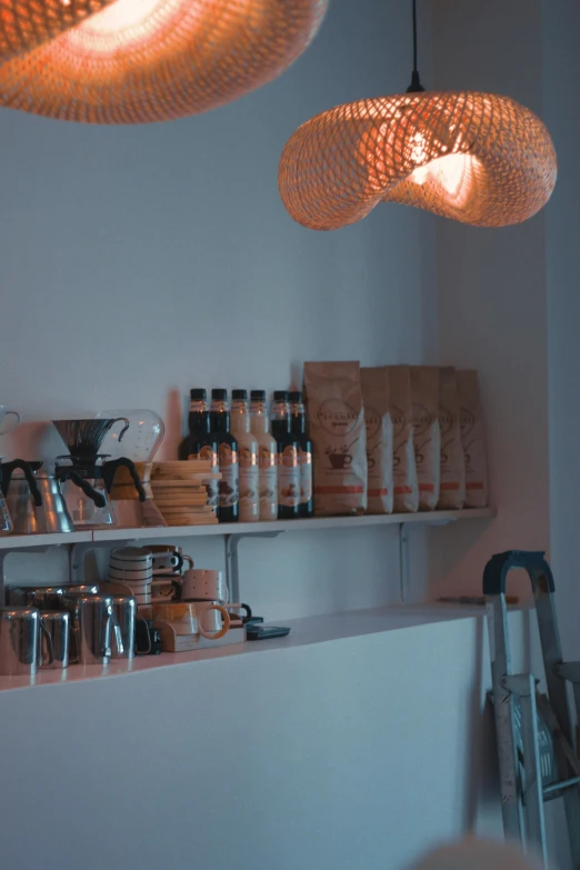 the light is hanging in the corner over the kitchen counter