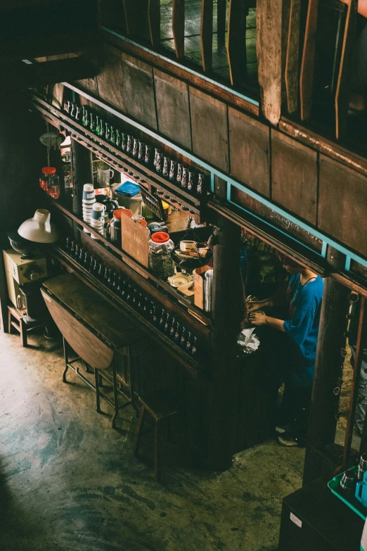 an old wooden piano inside of a store