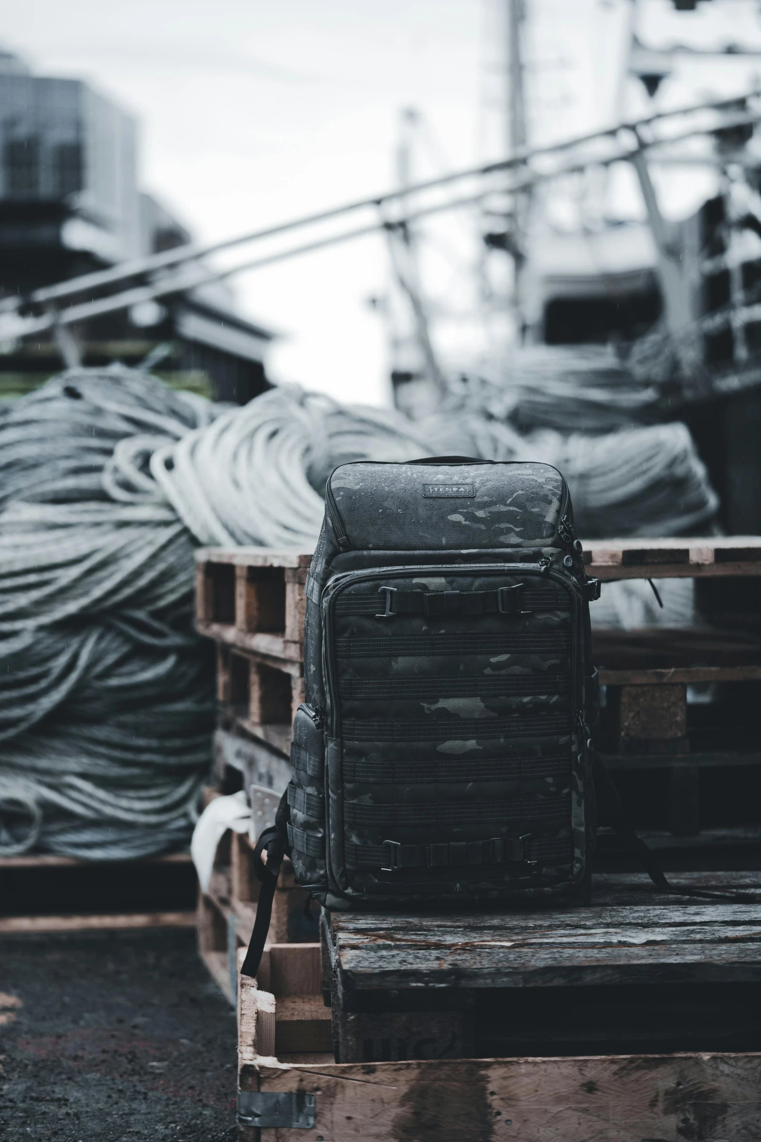 a bunch of luggage sitting on top of crates