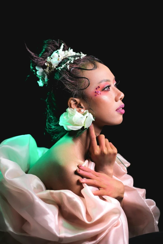 an african american model with pink makeup on