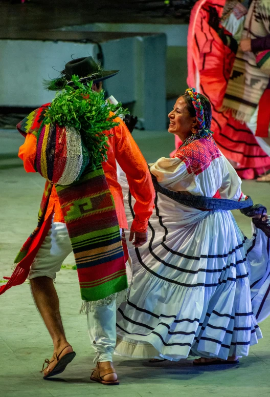 a couple performing an annual dance in the street