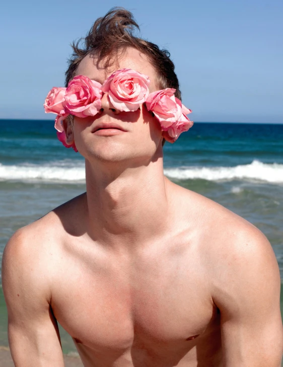 a man is seen with fake roses in his eyes