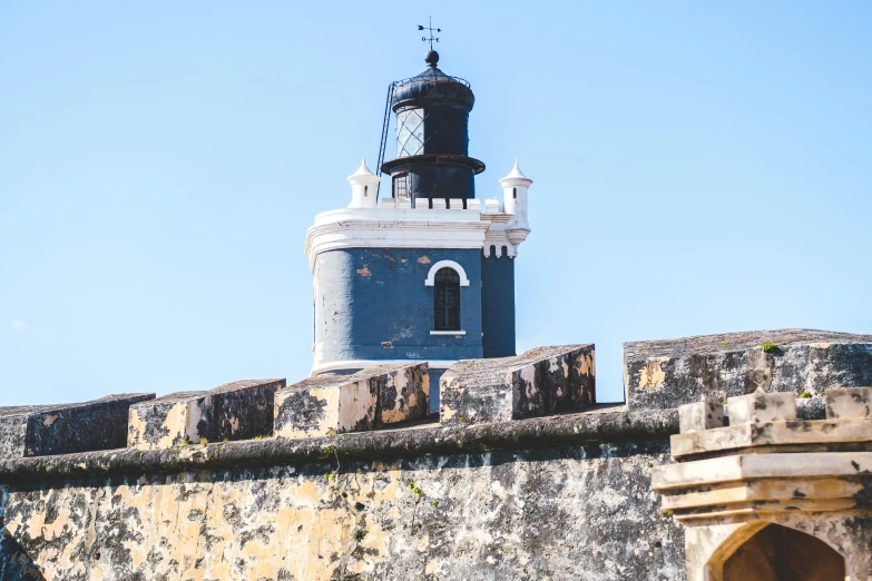 a tower of a building is shown with a bell