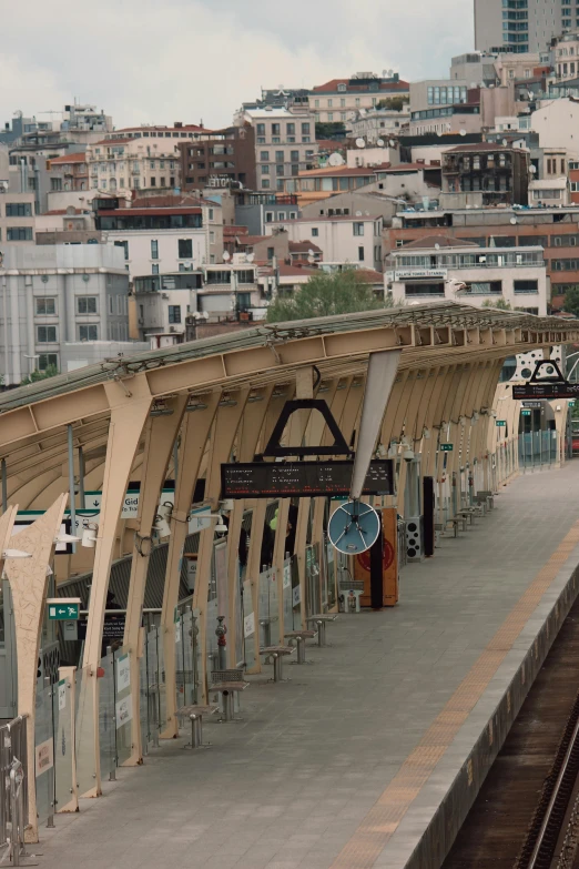 the train station has benches on both sides