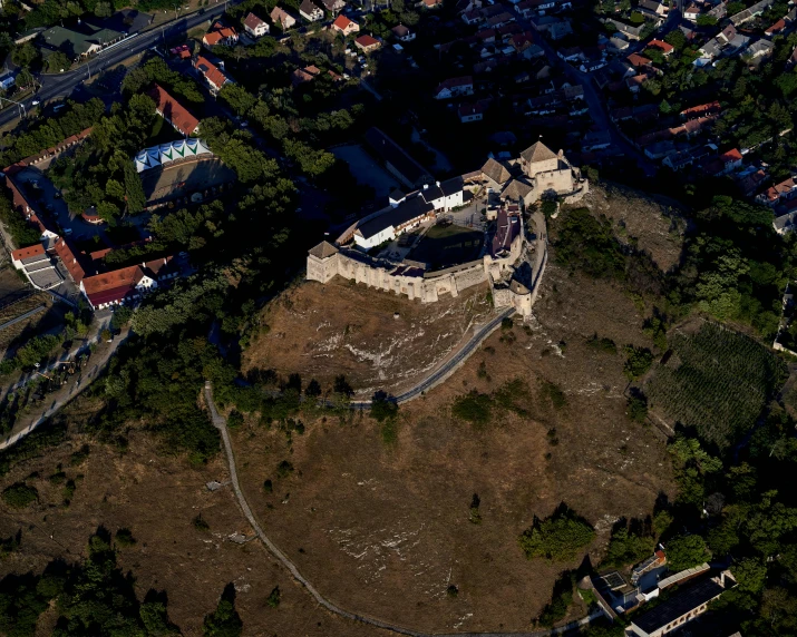 an aerial po taken on a small bird's eye view of a castle