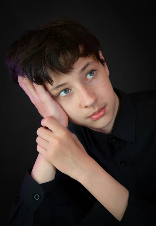 young man posing for the camera in black shirt