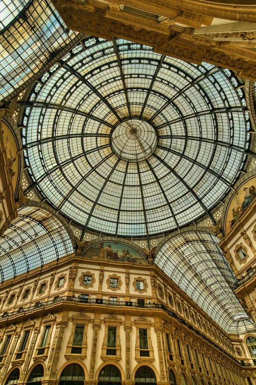 the view from inside of the building looking up at a ceiling