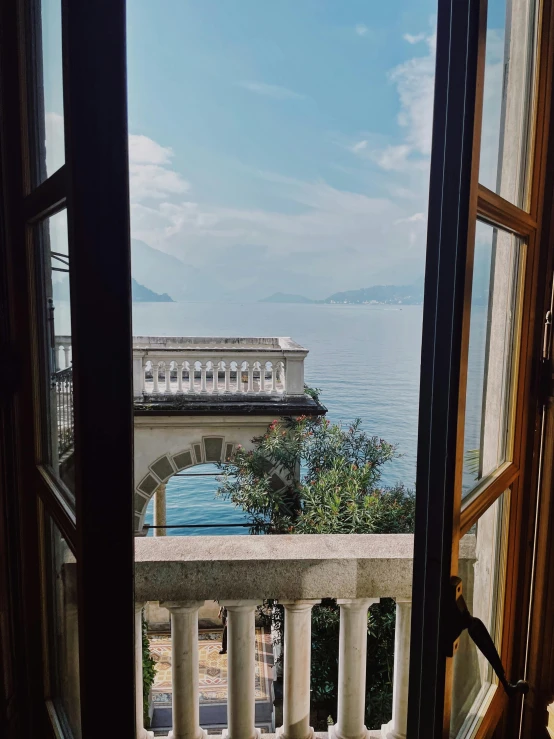 the view of the ocean from a balcony