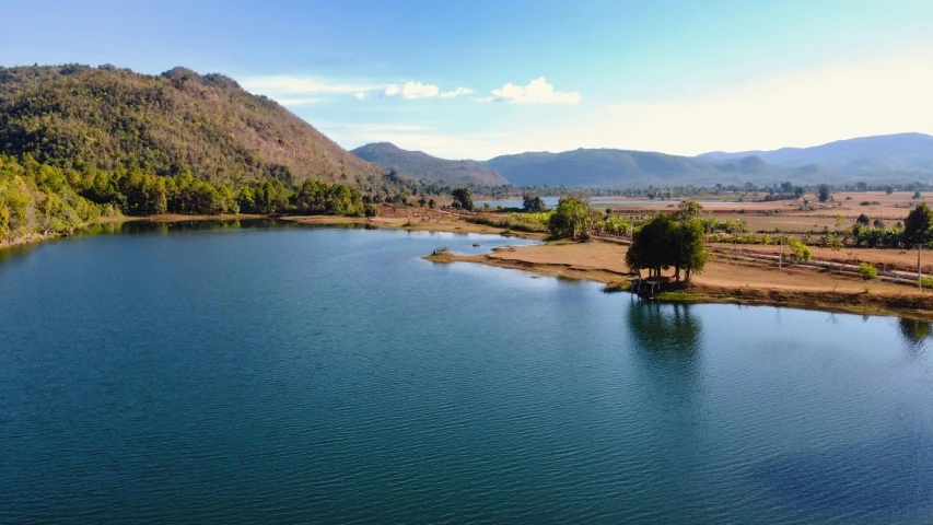 an image of a lake surrounded by mountains