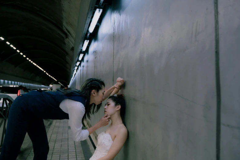 a bride and groom have their po taken as the man gives her away