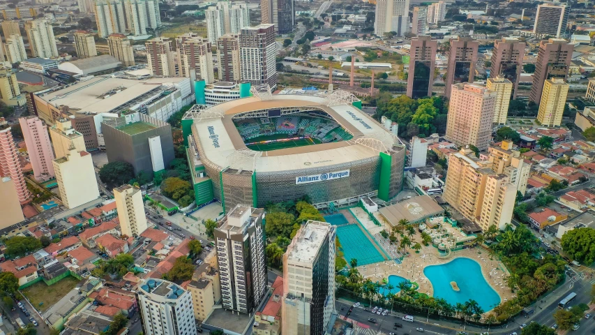 an aerial po of a baseball stadium in an urban setting