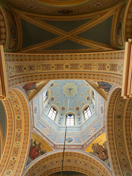 a church that has a clock on the wall