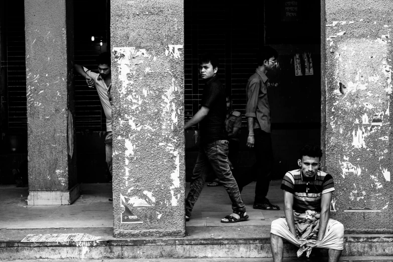 there are two boys sitting on the steps